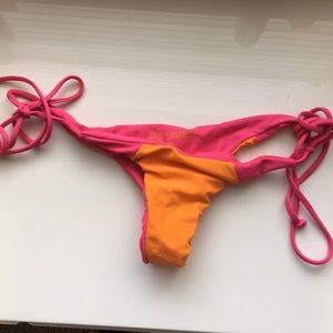 Mikoh pink and orange cheeky swim bottoms